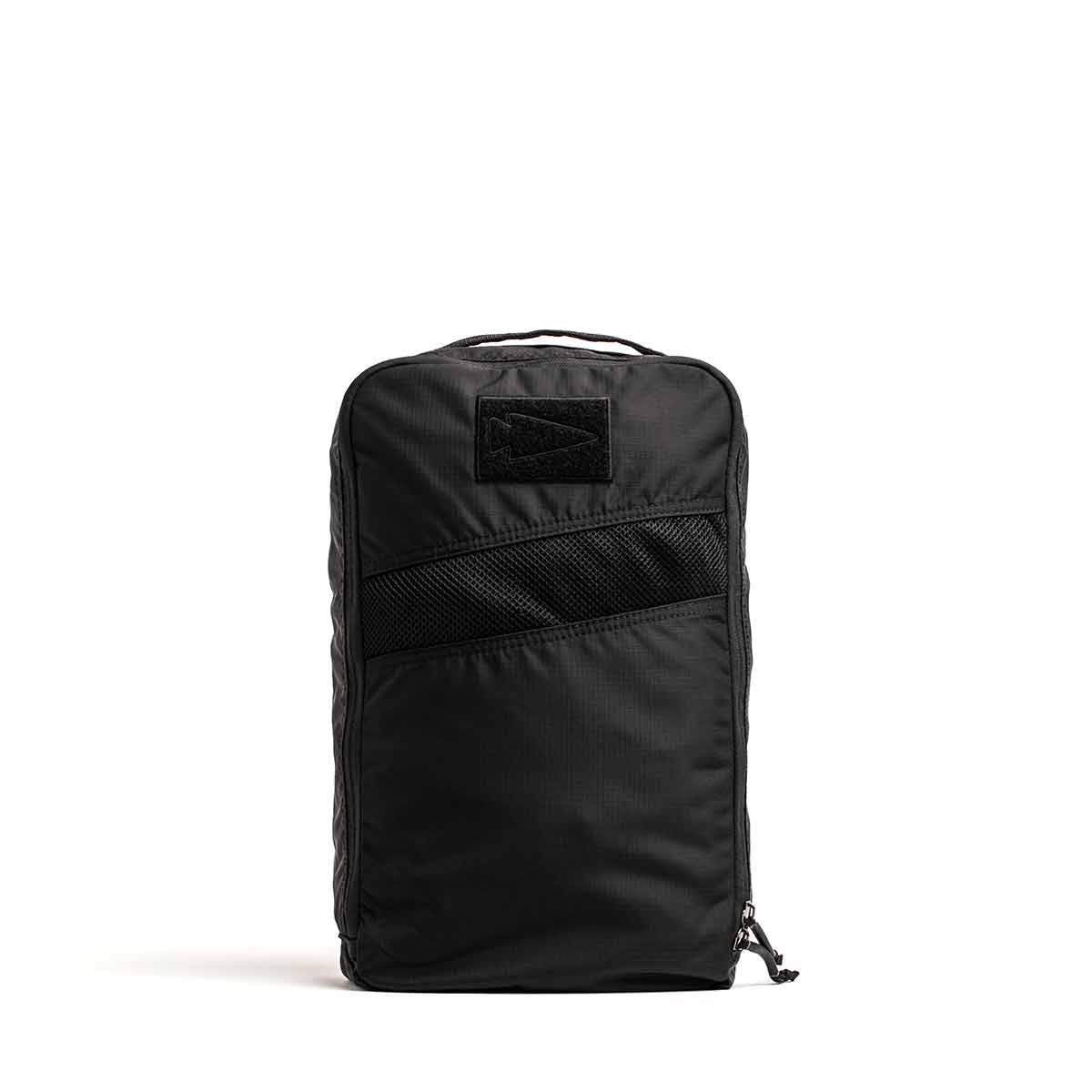 A black, rectangular zippered bag called the