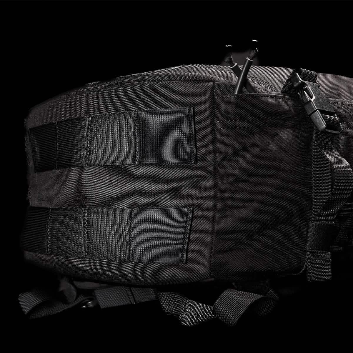 The GORUCK GR3 - Cordura is a black tactical travel backpack with MOLLE webbing, straps, and waterproof zippers, shown against a black background.
