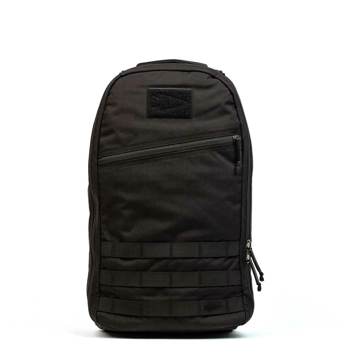 The GORUCK Bullet Ruck Laptop in Ballistic Nylon Cordura, featuring multiple zippers, front straps, and a bombproof laptop compartment, stands upright on a plain white background.
