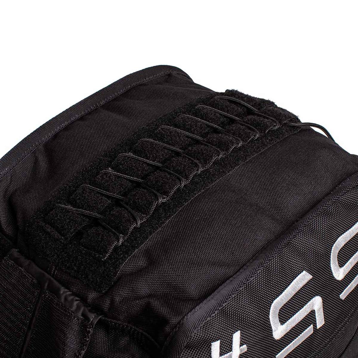 Close-up of GORUCK black rucksack with reinforced stitching and durable MOLLE webbing