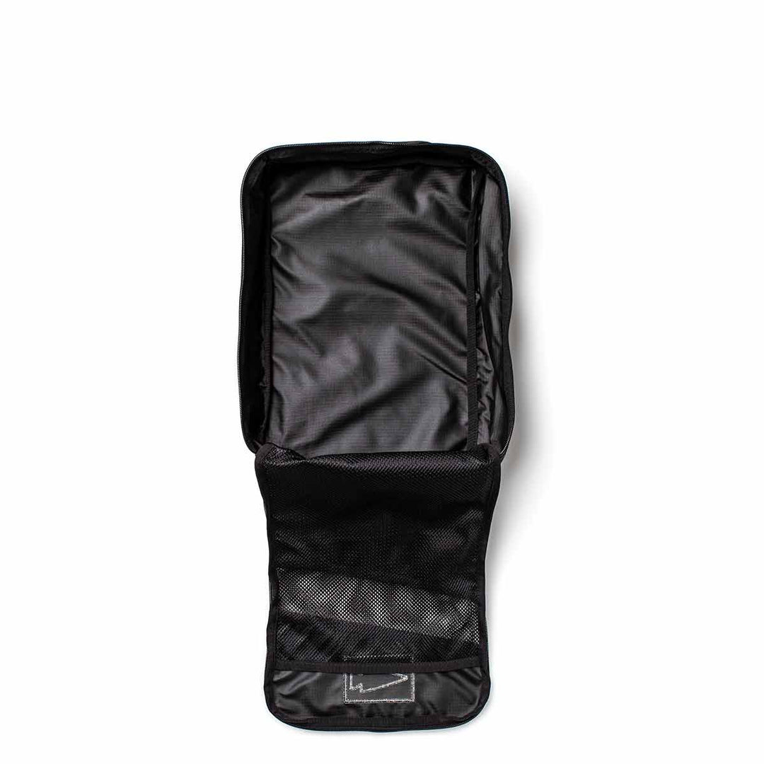 Open black GORUCK Shoe Bag - Ripstop ROBIC featuring a water-resistant design and mesh pocket for ventilation on a white background.