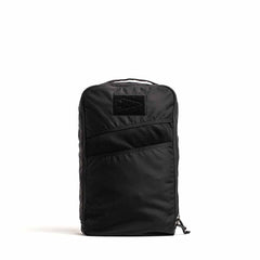 A black, rectangular zippered bag called the "Shoe Bag - Ripstop ROBIC" by GORUCK, featuring a water-resistant exterior and a front mesh pocket for ventilation, displayed against a white background.