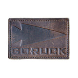 Patch crafted from genuine brown leather, showcasing an embossed spearhead and the text "GORUCK".