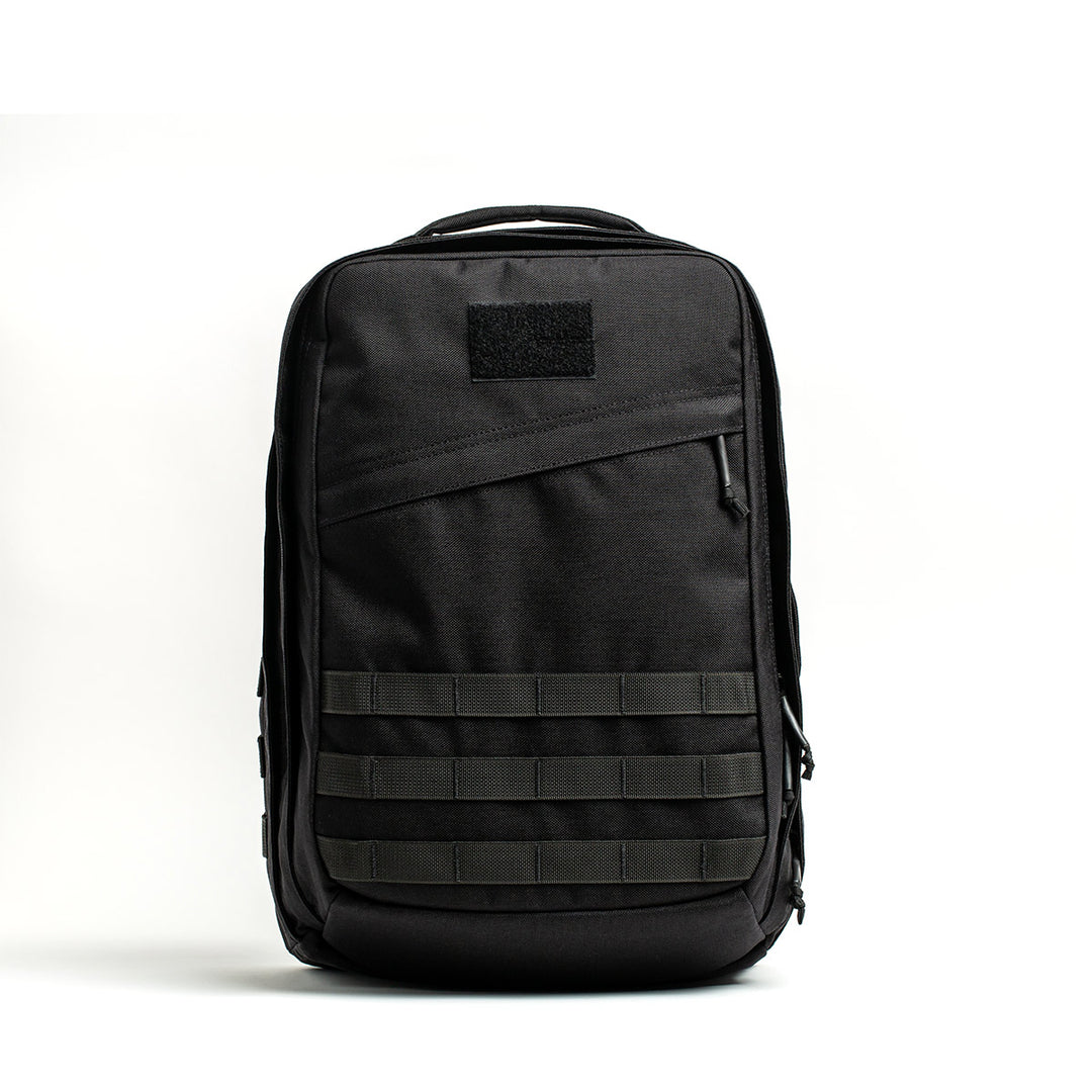 The GORUCK GR2 tactical backpack, designed with inspiration from Special Forces medical packs, features numerous compartments and sturdy straps. It is displayed on a simple white background and includes the Scars Lifetime Guarantee for complete confidence in your purchase.