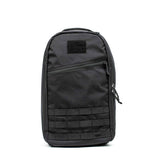 The Bullet Ruck - Classic -15L is a sleek black tactical backpack featuring a front zipper pocket and horizontal webbing, ideal as a 15L daypack for carrying daily essentials.