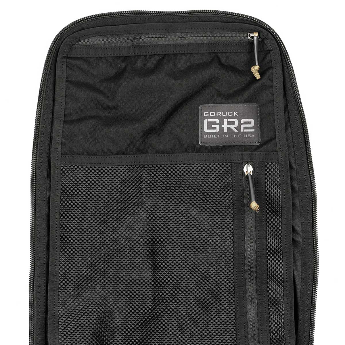 Black backpack featuring a mesh pocket and a tag labeled 
