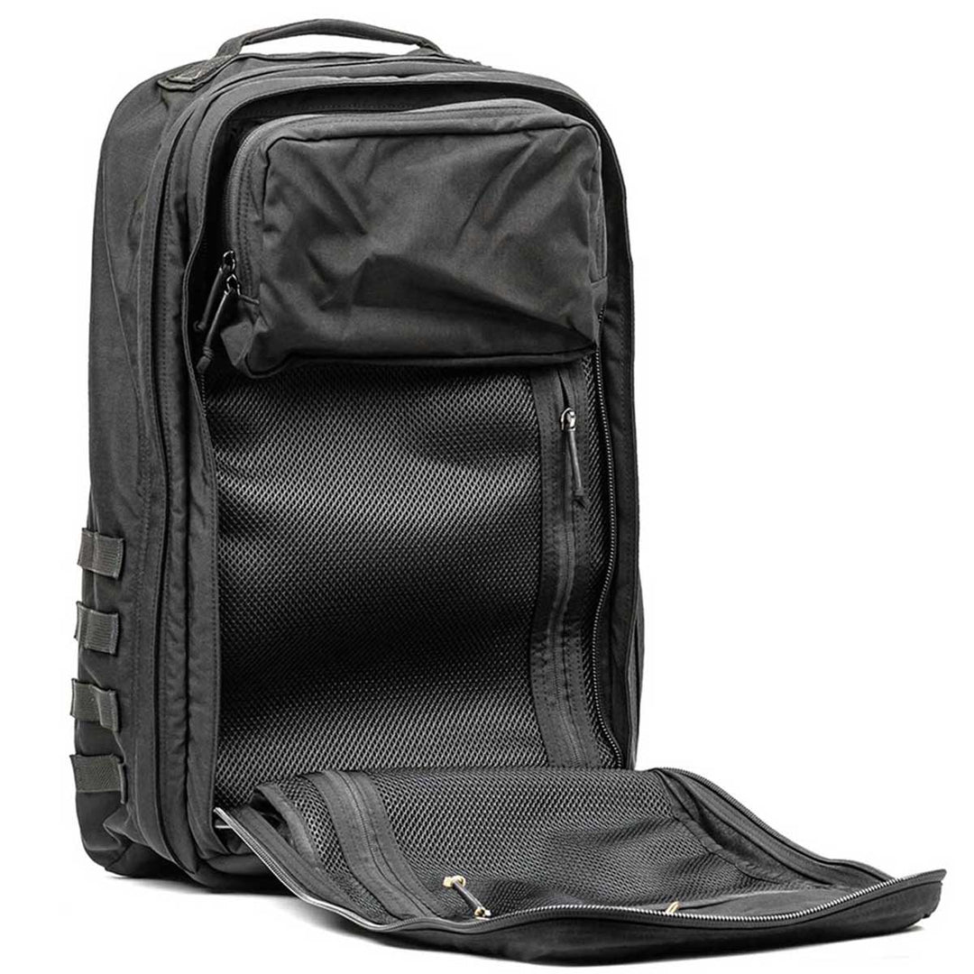 The GORUCK GR2 backpack, influenced by Special Forces medical packs, features a spacious black design with multiple compartments and zippers that all contribute to its sleek, stand-up structure. Additionally, it includes the enduring reliability of the Scars Lifetime Guarantee.