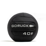 A GORUCK Sand Medicine Ball with a 40-pound weight label, featuring a convenient handle on a white background, ideal for boosting core stability in your home gym.