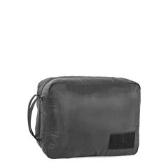 The GORUCK Packing Cubes are black, ultra-light nylon pouches with a side handle and a rectangular front patch—ideal for travel organization. Shown on a white background.
