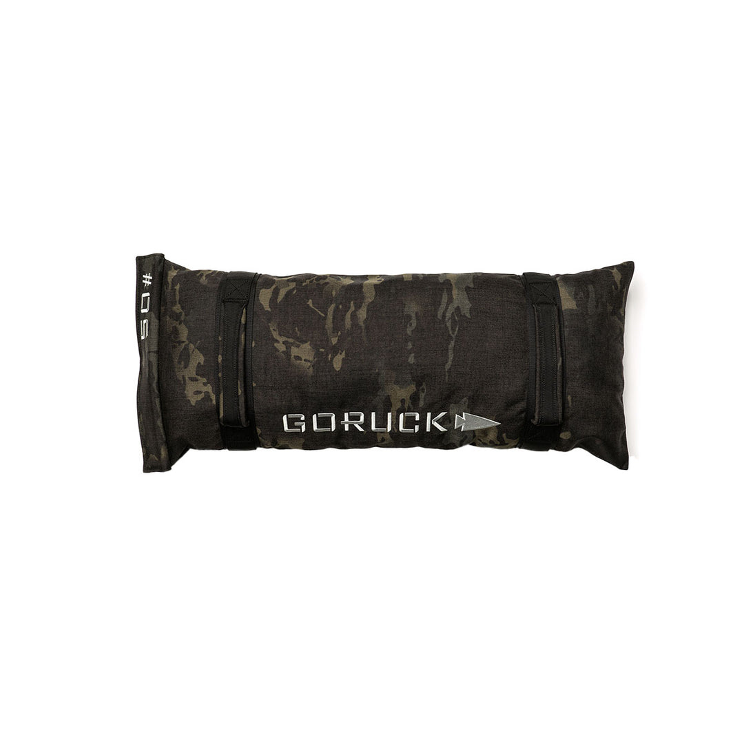 Camouflage Simple Training Sandbags by GORUCK with a weight label and sturdy handles for secure handling, ideal for home gym or training sessions.