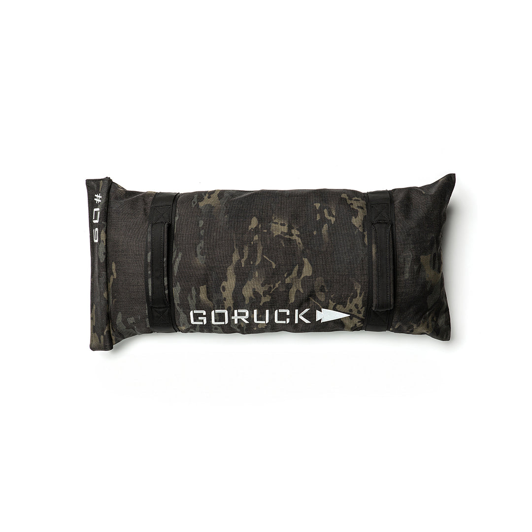 Black GORUCK Simple Training Sandbag with a camo pattern and heavy-duty handles, perfect for your home gym, labeled "#60.