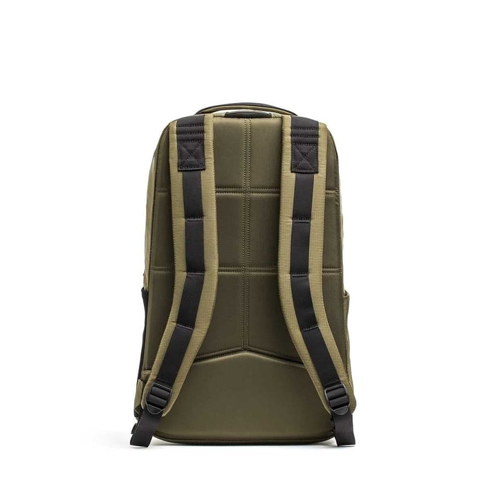 The Basic Rucker® is shown from the back in olive green, featuring black adjustable shoulder straps and a padded back panel.