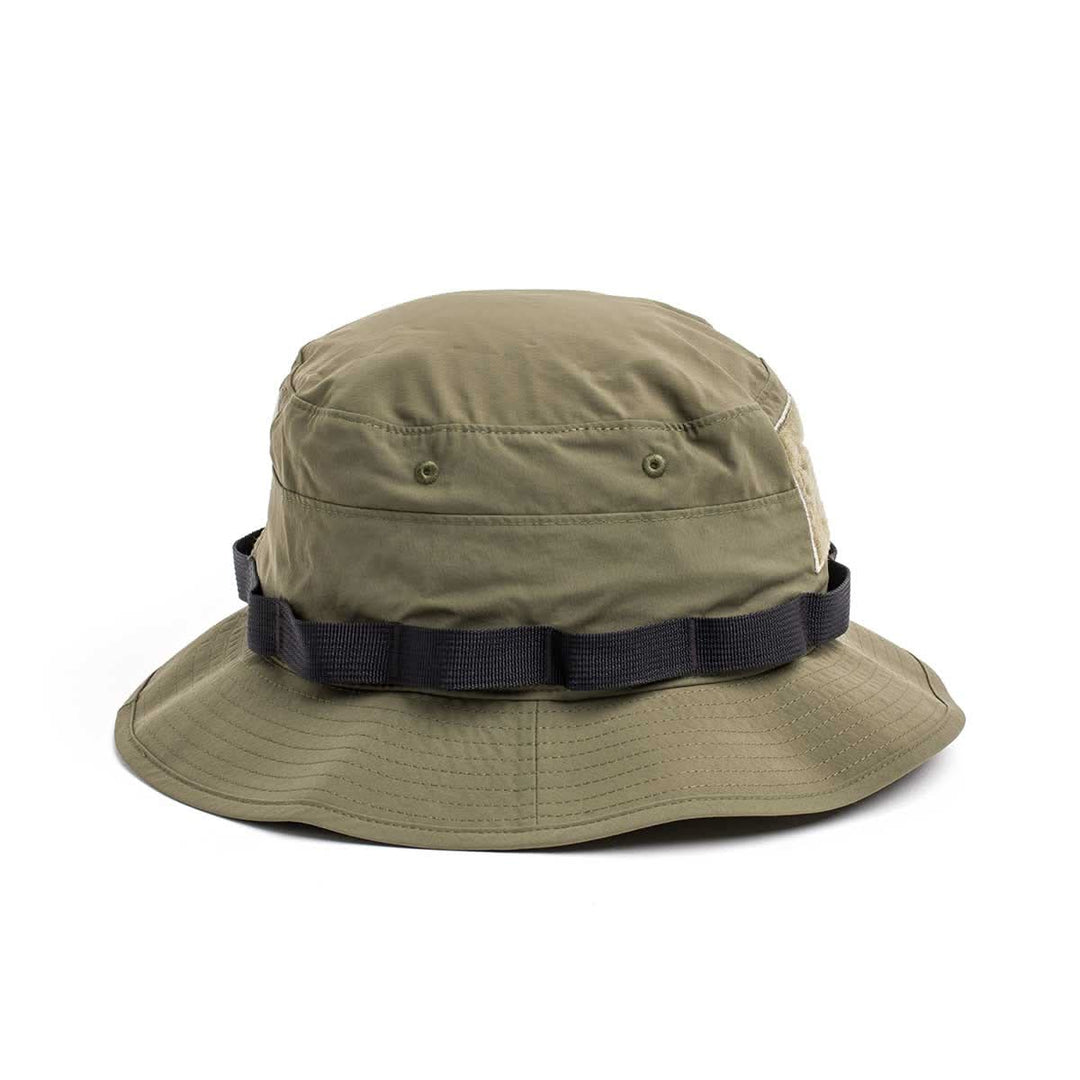 The GORUCK Boonie Hat - Tactical - ToughDry is an olive green, wide-brim hat with a black utility strap, made from durable ToughDry fabric and rated 50+ UPF. Shown on a white background.
