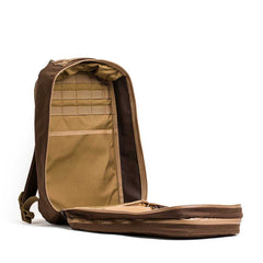 GORUCK brown Cordura backpack open to show two compartments and interior organizer pockets