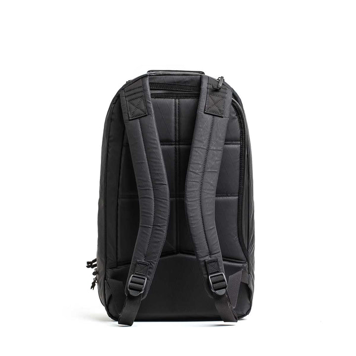 Double Compartment Bullet Ruck - XPAC shown from the back, featuring padded shoulder straps, quilted design, and a bombproof laptop compartment for ultimate protection.