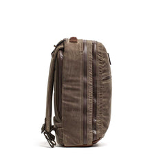 GORUCK Heritage Dark Oak backpack side view with dual zippers and stash pocket