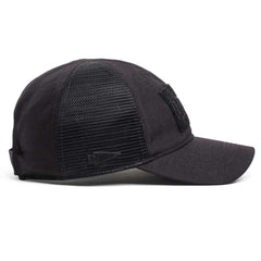GORUCK black mesh trucker hat with spearhead logo and Velcro patch, side view