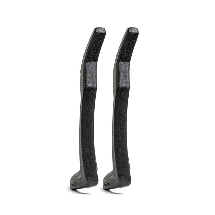 Two black Curved Ruck Plates stand upright, side by side, on a white background—durable and ideal for prepping gear for rugged rides or rucking weight vest training sessions.