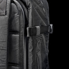 GORUCK black rucksack close-up, durable X-Pac material, compression strap detail