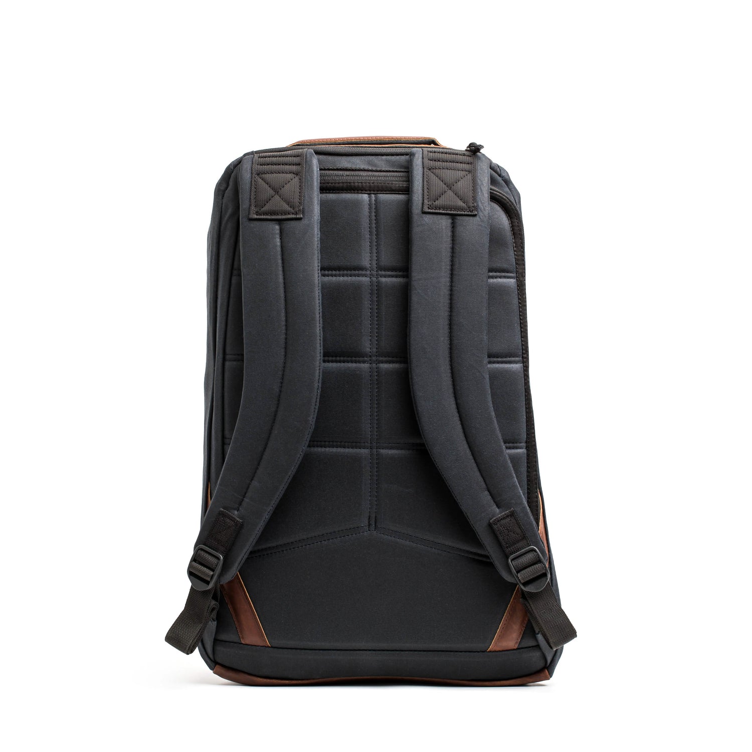 Back view of the GORUCK GR1 USA - Heritage rucksack in waxed duck canvas, featuring padded straps and brown accents on a white background.