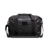 GORUCK black 32L XPAC kit bag with handles, shoulder strap, and front zipper pocket