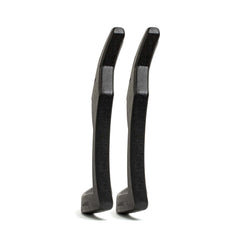 Two black Curved Ruck Plates from GORUCK EU stand upright, viewed from the side on a white background—ideal for stashing in your rucking weight vest for added resistance during workouts.