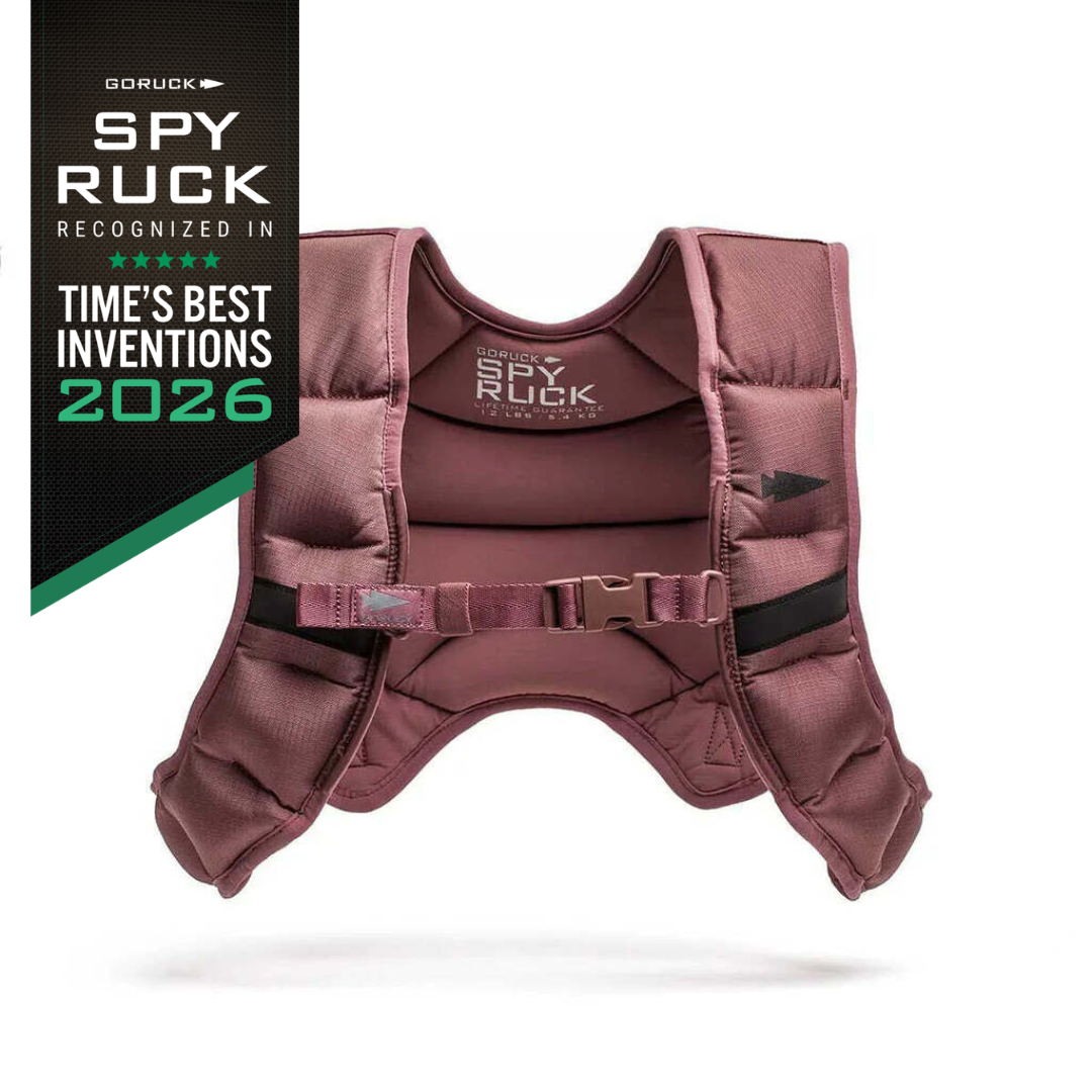 Mauve Spy Ruck weighted vest with a buckle strap and a badge noting it was one of Time’s Best Inventions of 2026.