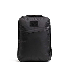 GORUCK black rucking backpack with top handle and front patch on white background