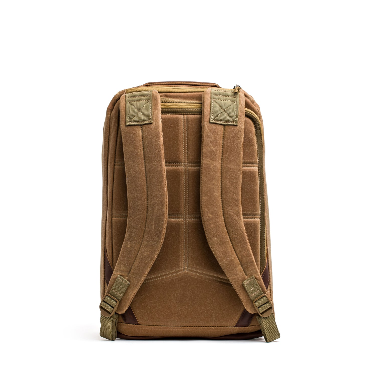 The brown GORUCK GR1 USA - Heritage rucksack, featuring padded straps and a quilted back panel, is shown from the rear on a white background.