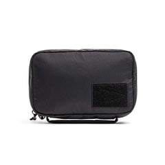 GORUCK black tactical field pouch with Velcro patch on white background