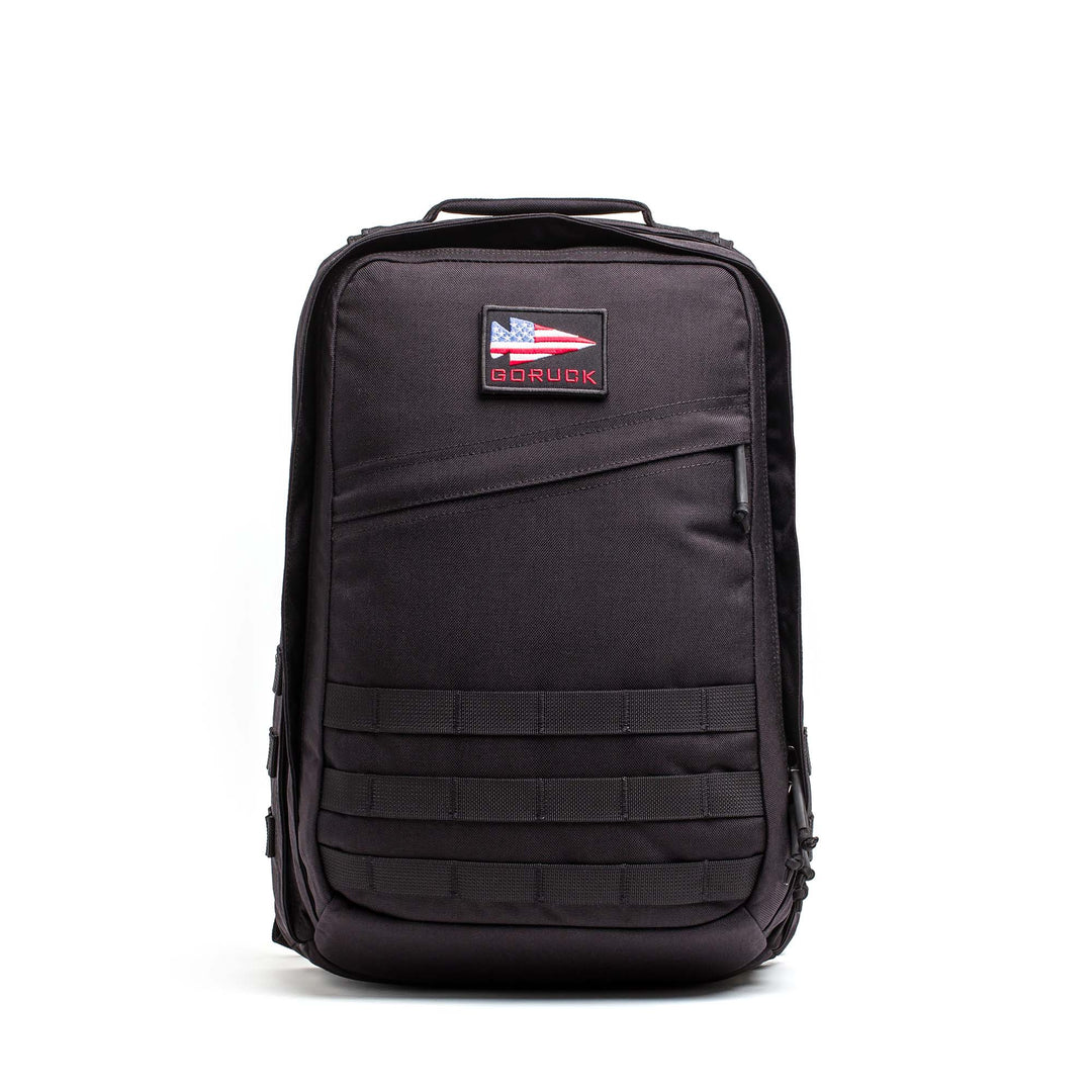 The GORUCK GR2, shown in black with an American flag patch on the front, is a rugged Special Forces-inspired backpack that's perfect for any adventure or as your carry-on travel bag.