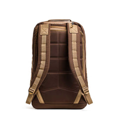 The GORUCK GR2, shown from the back with padded straps and a top handle, is perfect as a carry-on travel bag and is displayed against a white background.