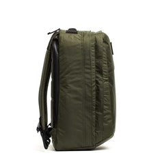 GORUCK GR2 34L rucksack in dark green XPAC, side view highlighting stash pocket and durable build
