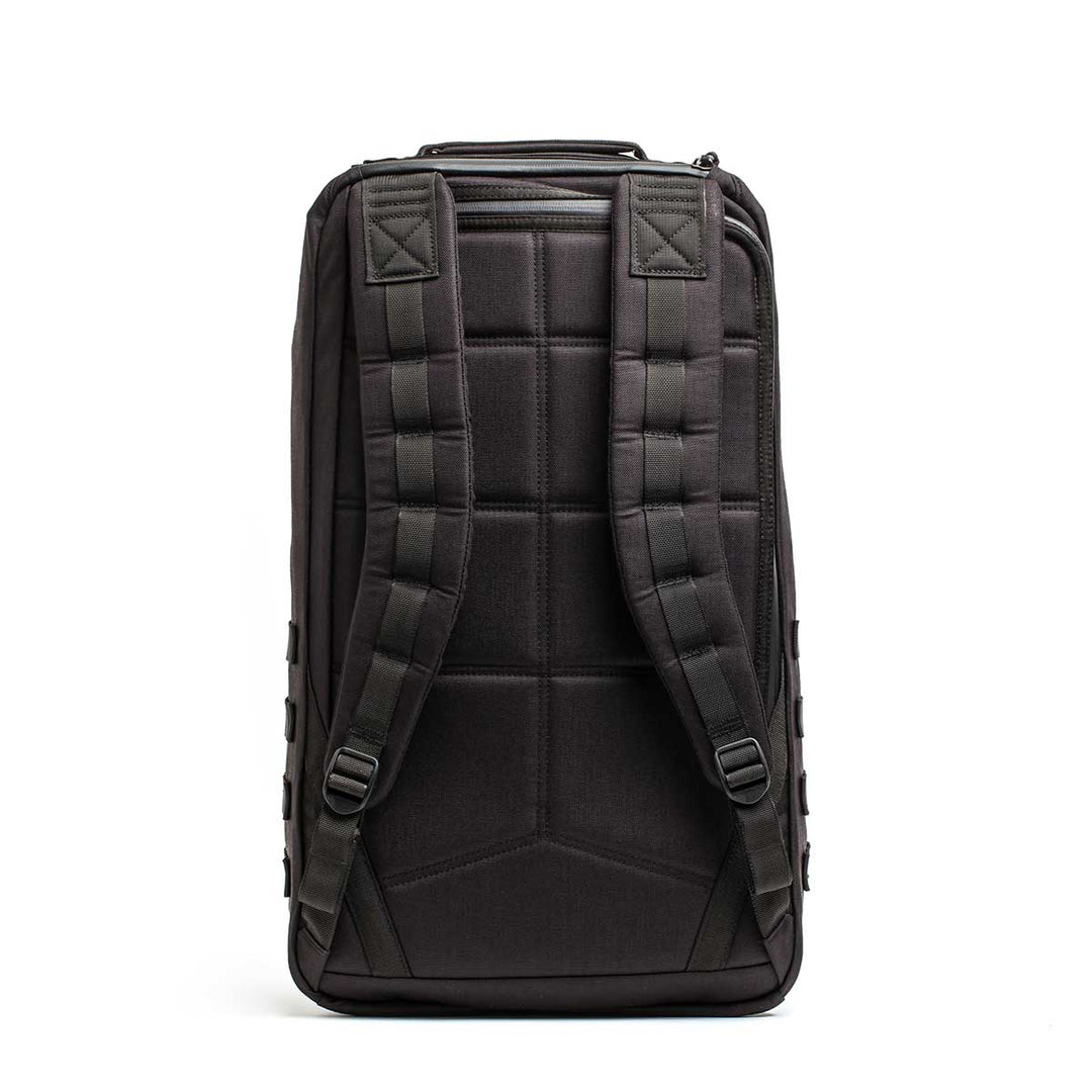 The GORUCK GR2 - USA backpack is shown from the back, highlighting padded shoulder straps and a quilted back panel—ideal as a carry-on or for anyone wanting a Special Forces-style ruck.