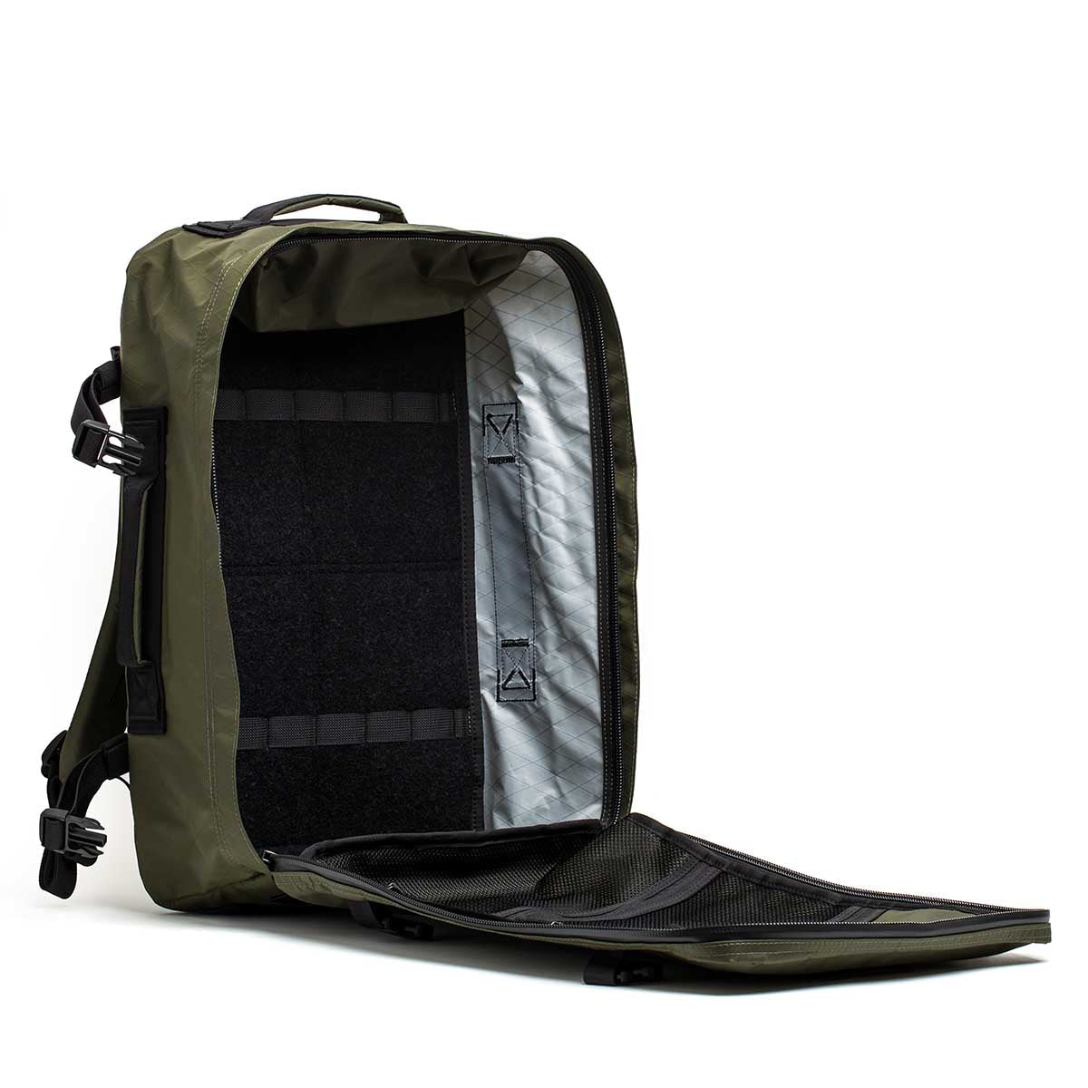 GORUCK dark green rucksack open to show spacious interior and rugged construction
