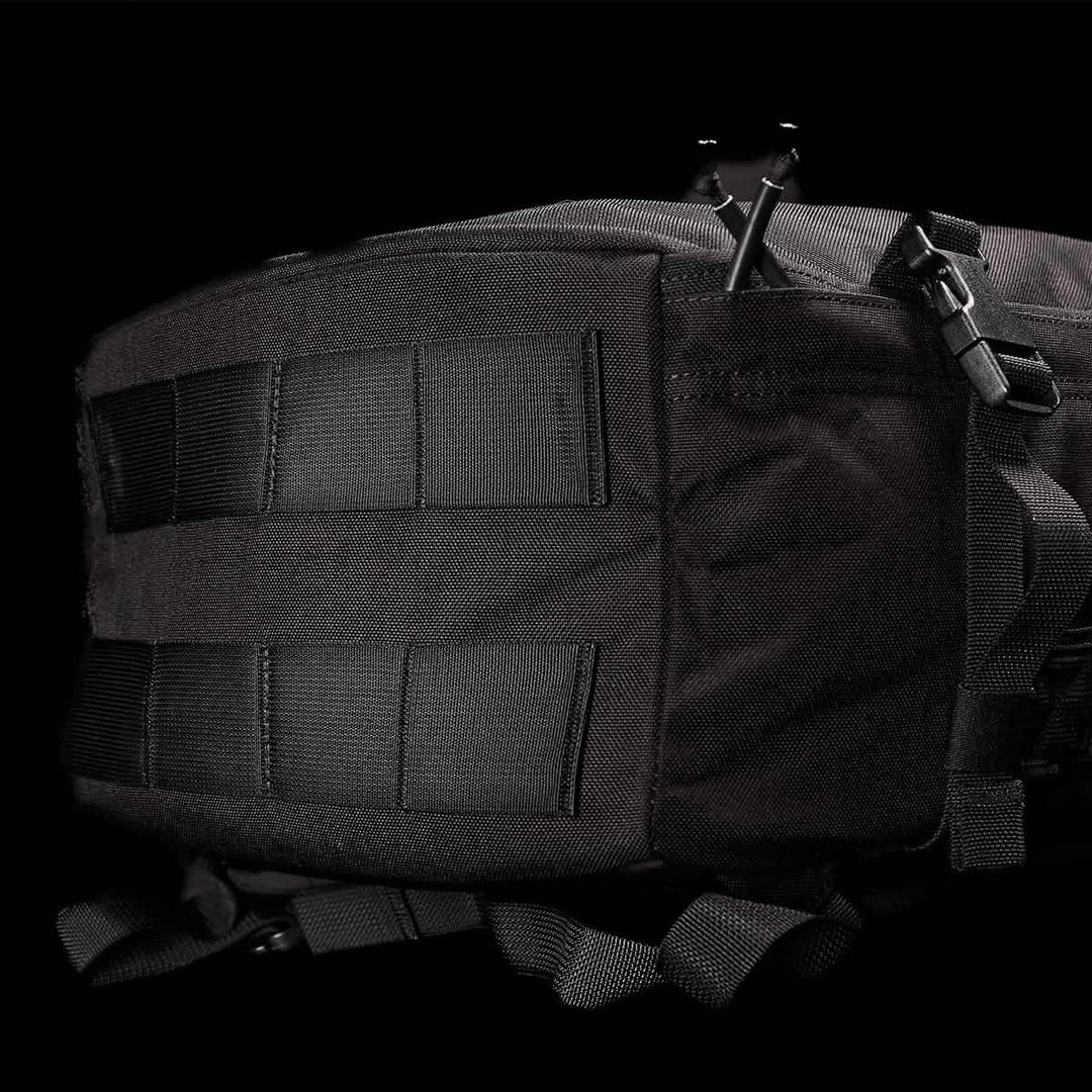 The GORUCK GR3 - Cordura is a black tactical travel backpack with MOLLE webbing, straps, and waterproof zippers, shown against a black background.
