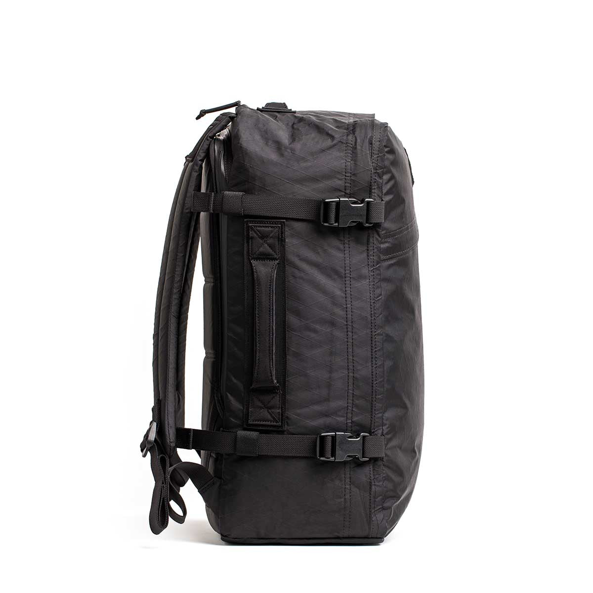 GORUCK black rucksack backpack with side handle and compression straps, side view