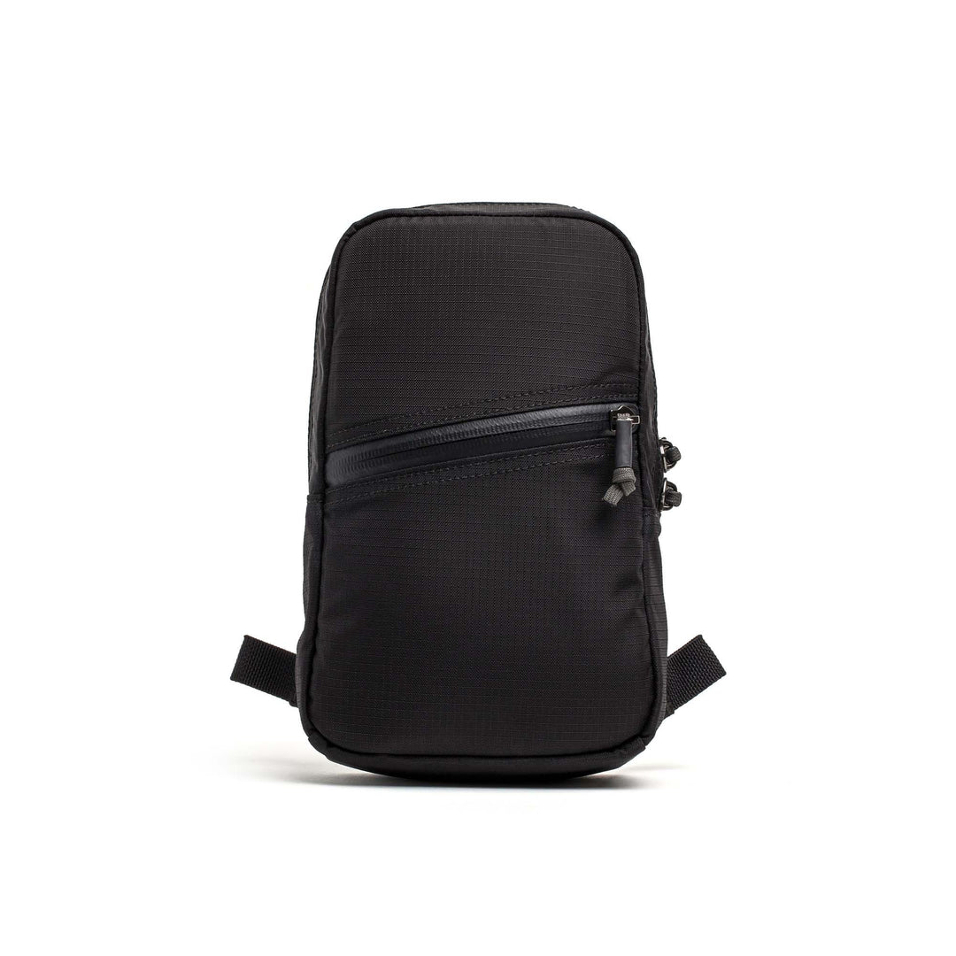 GORUCK black compact ripstop pouch with angled zipper on white background
