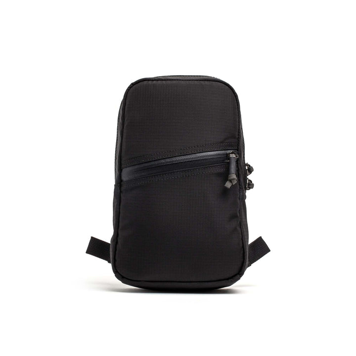 GORUCK black compact ripstop pouch with angled zipper on white background