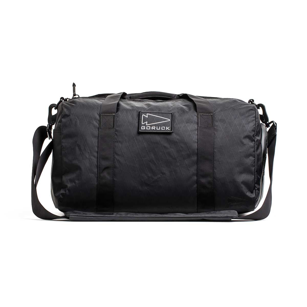 GORUCK black duffel gym bag with shoulder strap, durable rucking gear on white background