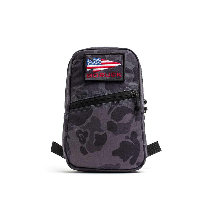 GORUCK black frogskin camo rucking pouch with USA flag patch on white background