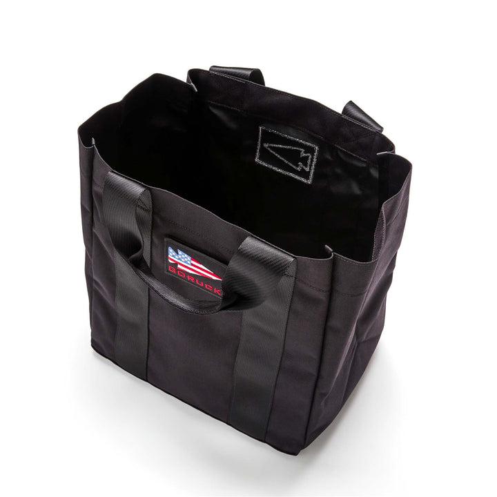 GORUCK black tote bag with sturdy handles and American flag patch, rugged rucking gear design