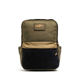 The KR1 2.0 - Kid Ruck by GORUCK is a durable khaki backpack featuring a black front pocket and a tan "GORUCK" patch on the top front, expertly designed to withstand daily adventures and serve as the ultimate indestructible school bag for young explorers.