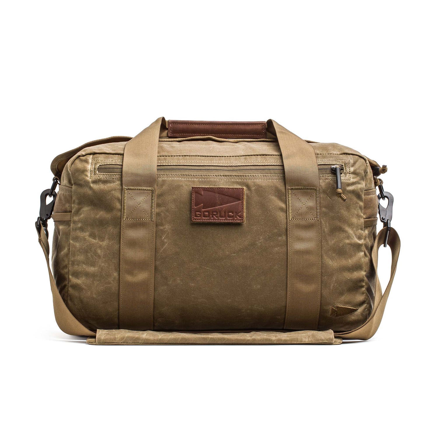 Kit Bag - Waxed Canvas by GORUCK: A tan duffel featuring a shoulder strap, leather accents, front zipper pocket, and a 