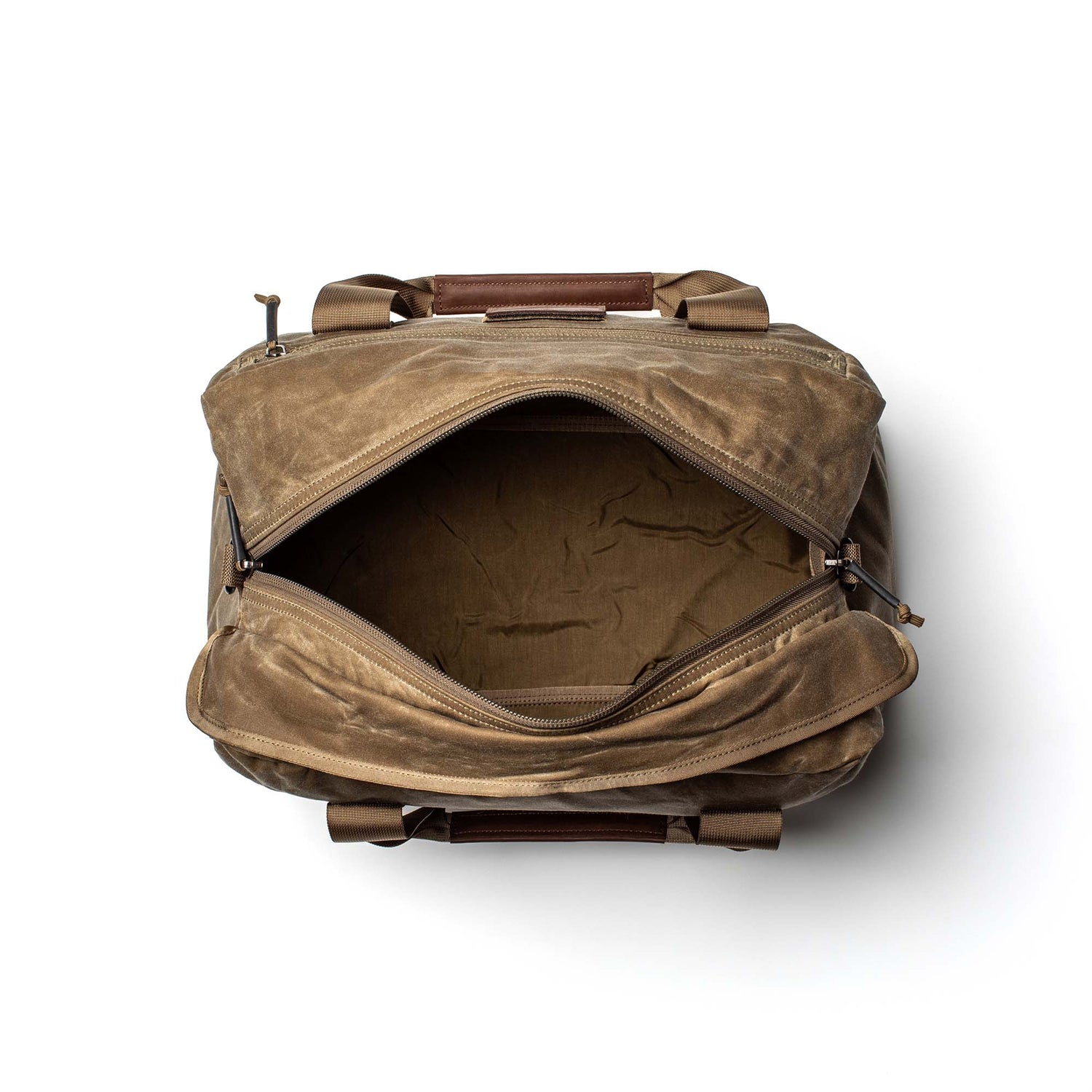Open GORUCK Kit Bag - Waxed Canvas with visible empty interior, photographed from above on a white background.