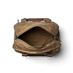 Open GORUCK Kit Bag - Waxed Canvas with visible empty interior, photographed from above on a white background.