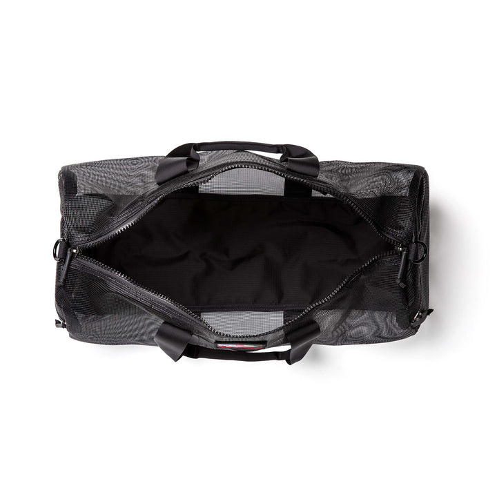 Top view of an open Mesh Gym Bag with a zipper, displaying the empty main compartment.