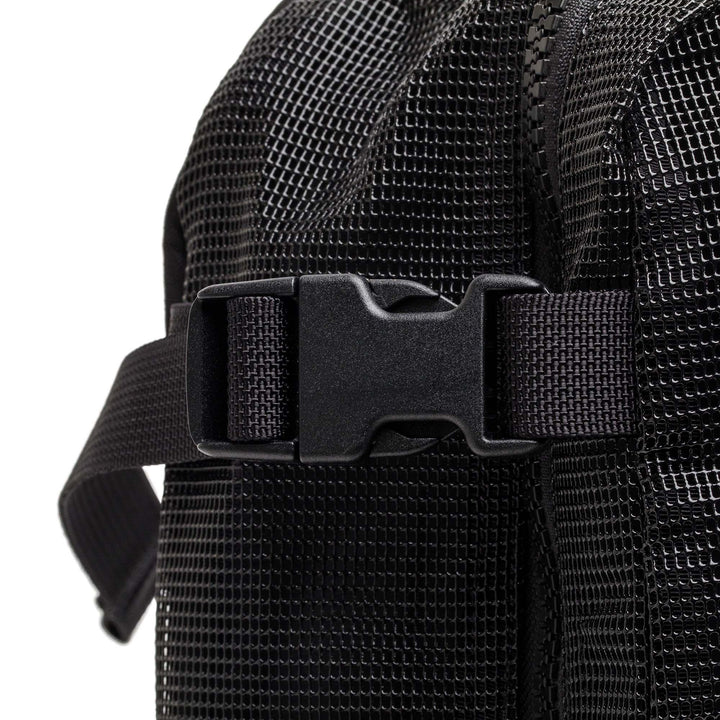 GORUCK black mesh rucksack close-up showing durable buckle and textured fabric