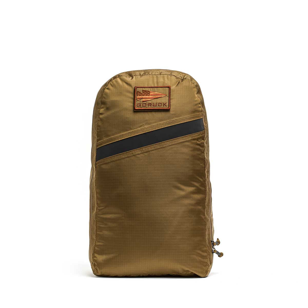 The GORUCK Packable Bullet Ruck - Ripstop ROBIC® is a lightweight brown backpack featuring a zippered design, a black diagonal stripe, and a rectangular GORUCK patch on the front—perfect for daily use or quick adventures.