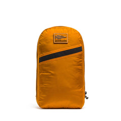 The Packable Bullet Ruck - Ripstop ROBIC® by GORUCK is an orange backpack with a diagonal black stripe and patch, shown on a white background. Made from durable Ripstop ROBIC® nylon for enhanced strength, this lightweight, packable backpack features AquaGuard zippers to keep your gear protected in any weather.